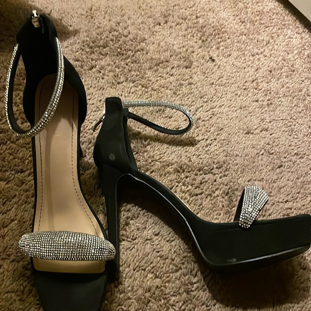 Black and silver stiletto heels
